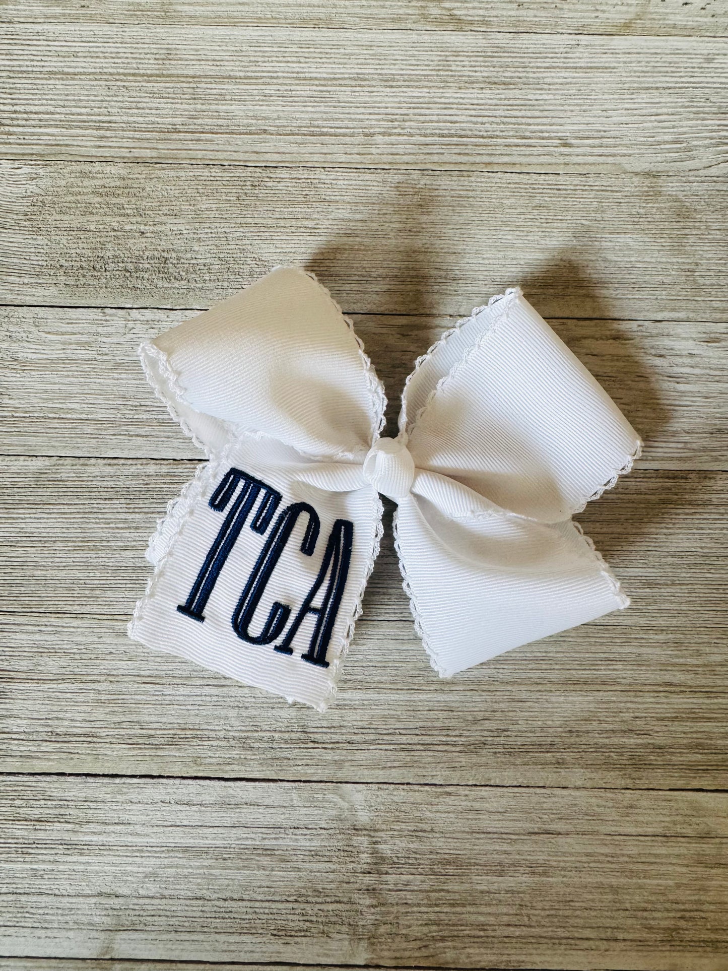 TCA Bow!