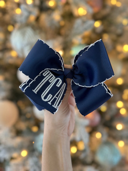 TCA Bow!